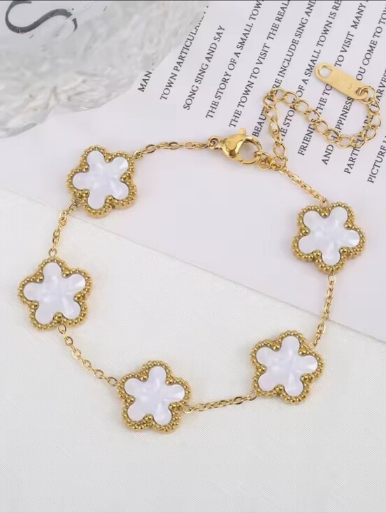 Anthropologie Jewelry - Gold Bracelet with White Clover Motifs